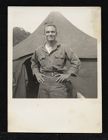 Max Ray Joyner, Sr., posing in front of barracks